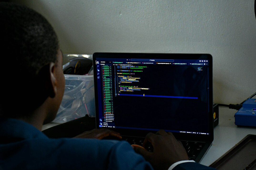 individual studying coding